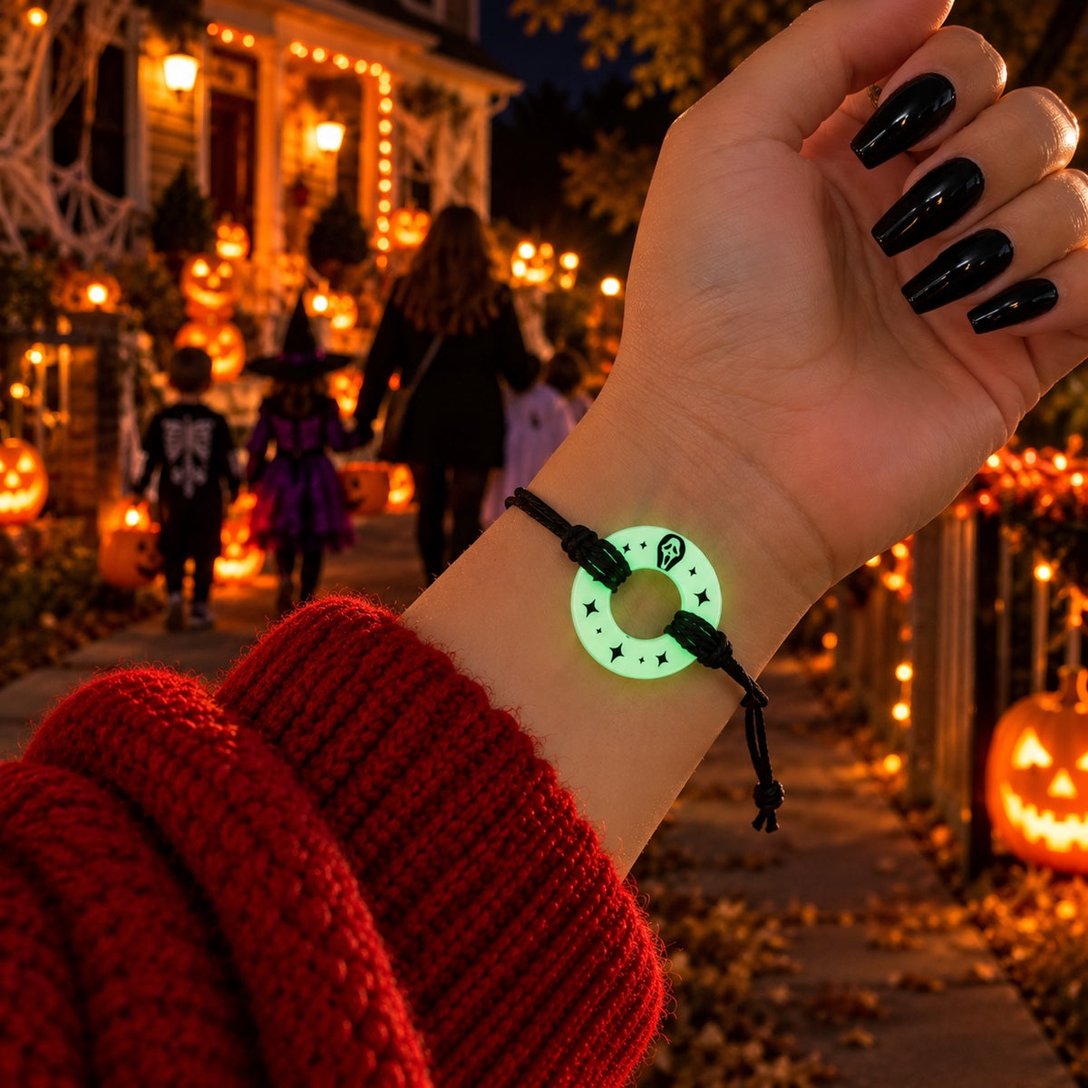 Glow-in-the-dark token with small black spooky mask engraved near the top